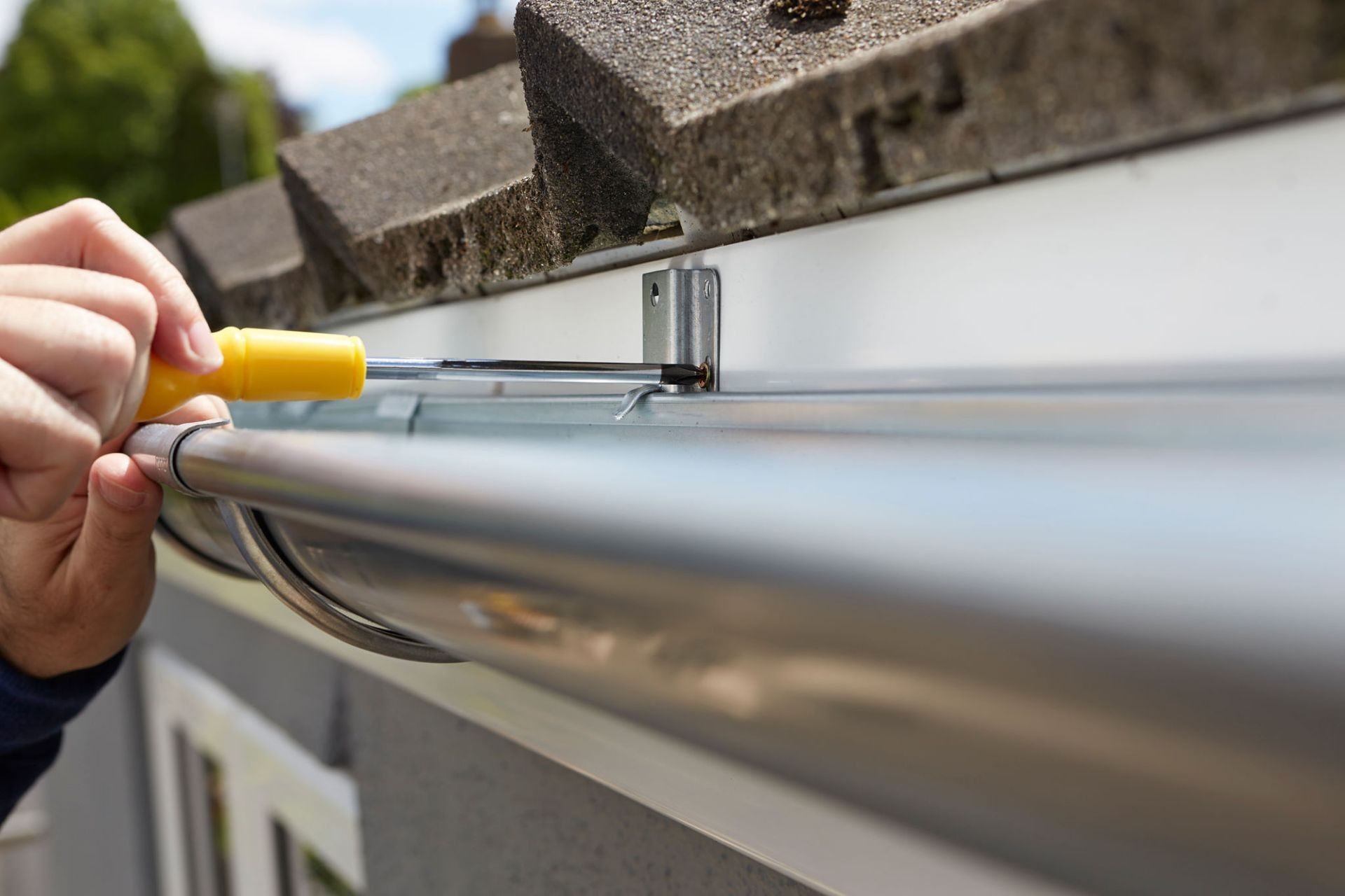 Gutter repair in progress on a Tampa home.